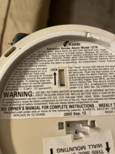 Smoke detector found during inspection 7 years past its expiration date.